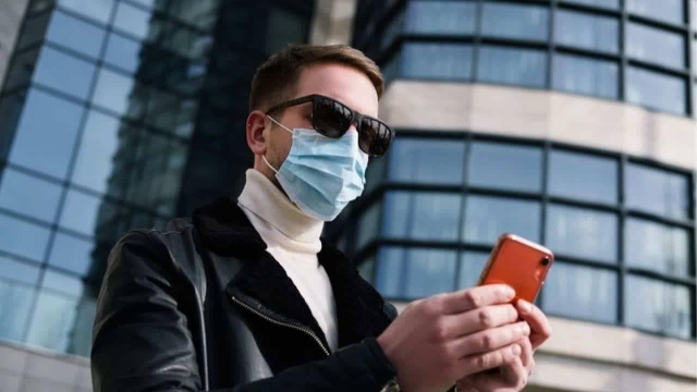 A person using his mobile